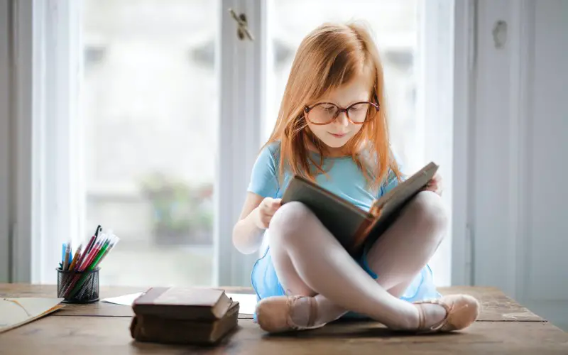 Girl reading which is added in STREAM education
