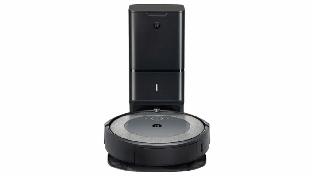 A Roomba i3 docked in the iRobot clean base which permits automatic dirt disposal