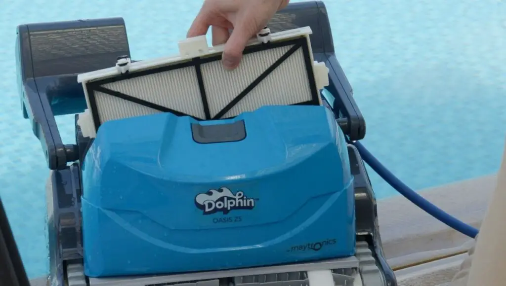 The cartridge filters being removed from the Dolphin Oasis Z5i