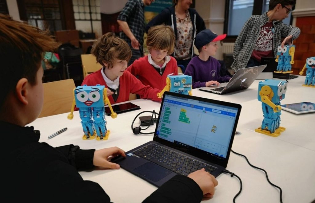 5 Marty the Robot's being used by children in  a classroom environment