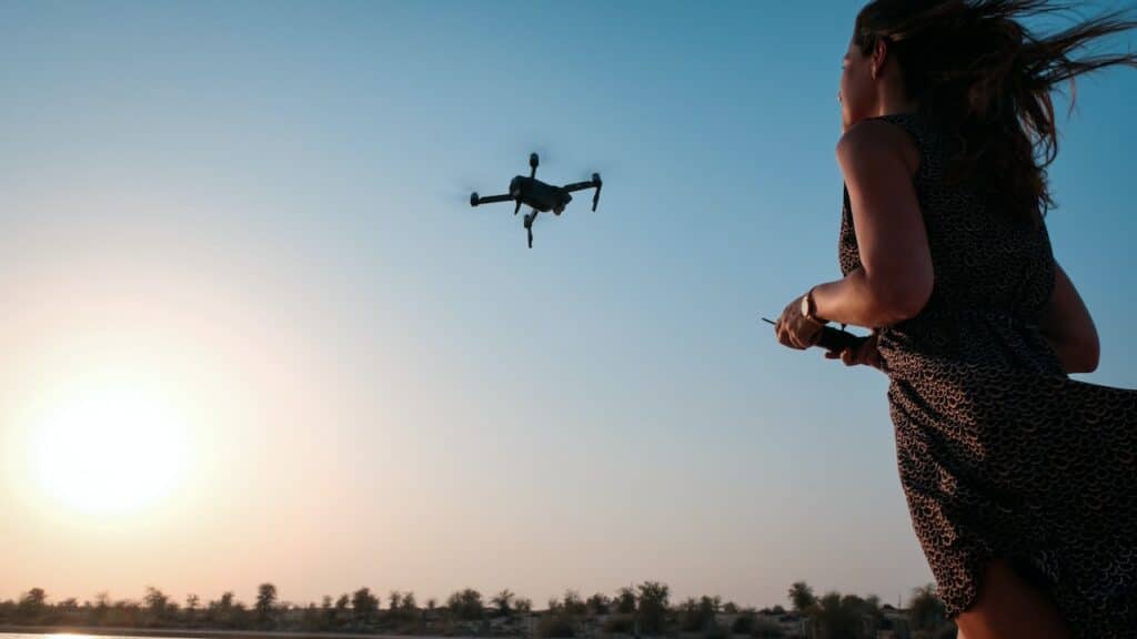 A woman flying quality drone
