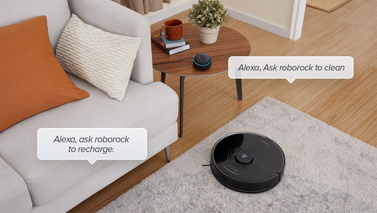 Roborock s7 on a fur rug in a living space connecting to alexa