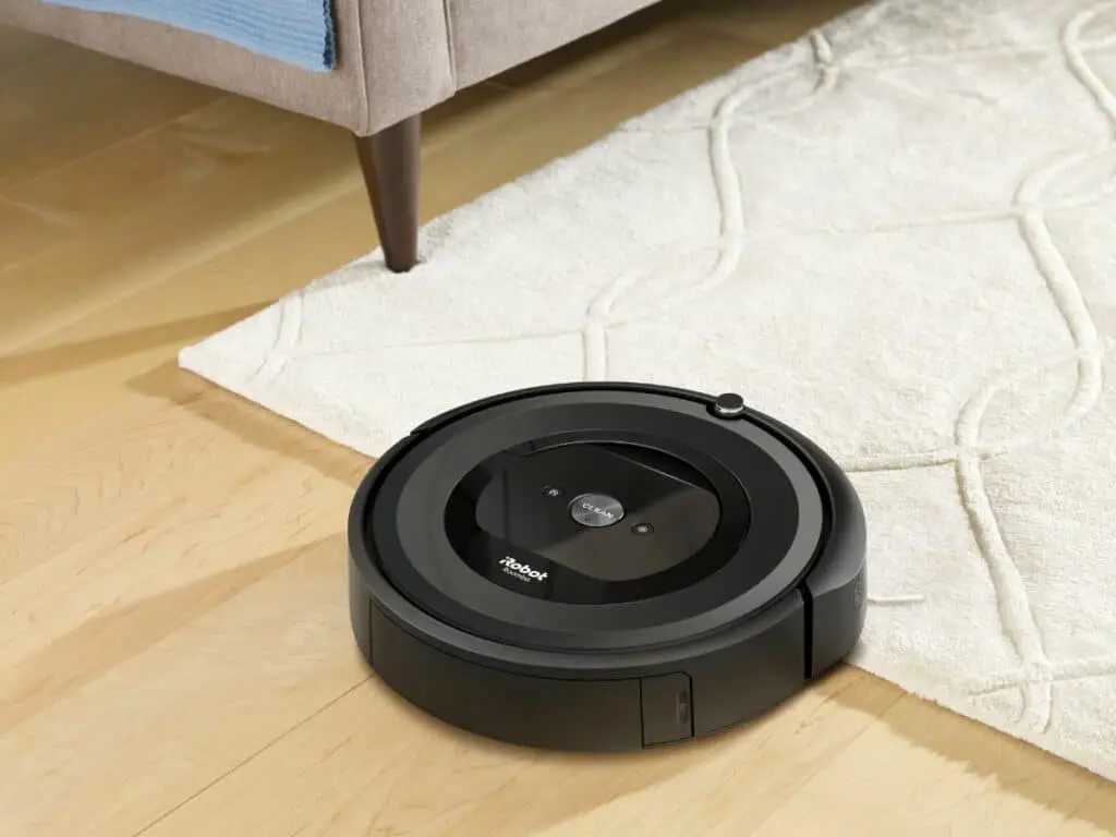 The iRobot Roomba e5 moving from hardwood to carpet. A great choice if you are worried about How Much is a Roomba