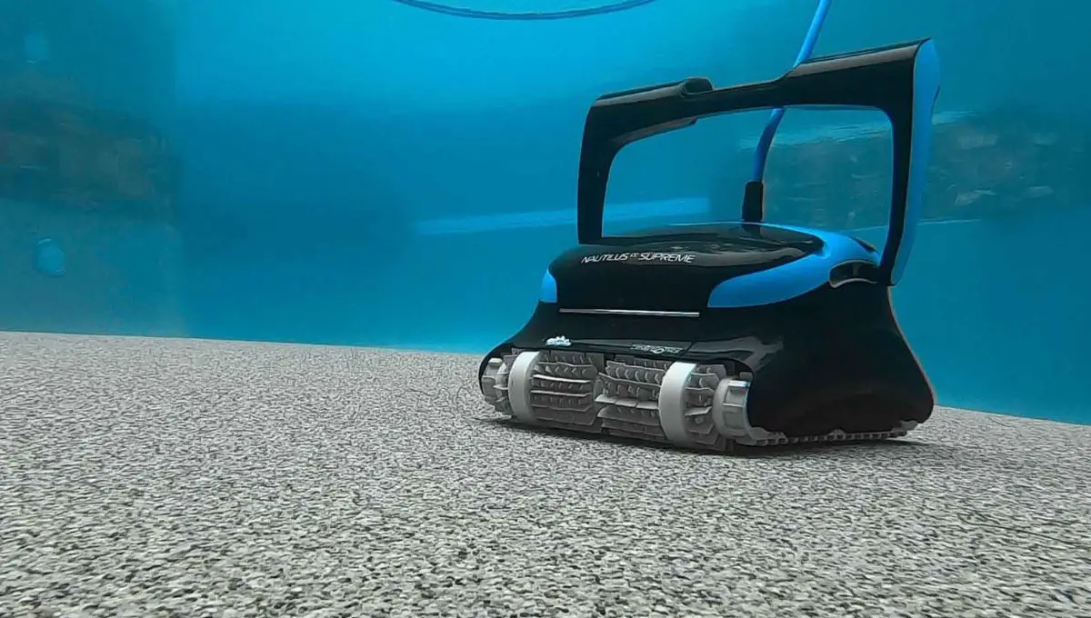 A robotic pool cleaner submerged in a pool