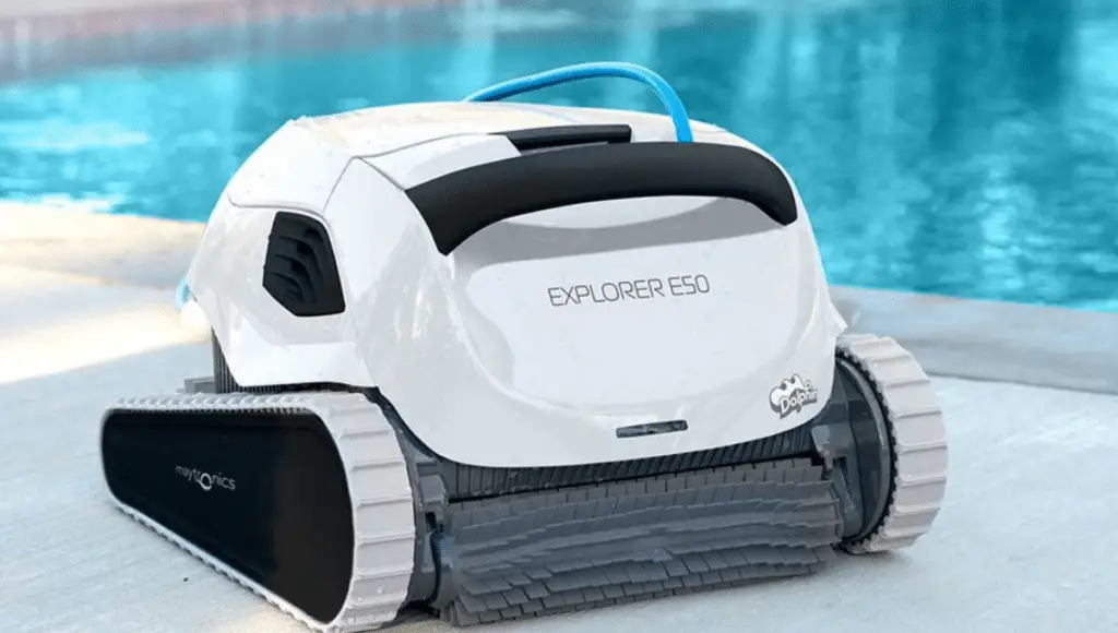 dolphin explorer E50 robotic pool cleaner beside a pool